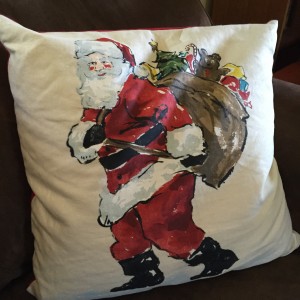 The Christmas pillow on my couch in June