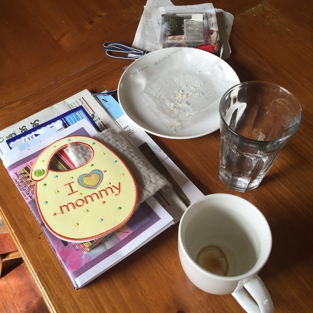 plates, cups, and piles of paper